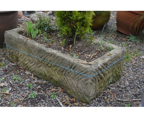 A 20TH CENTURY RECTANGULAR STONE PLANTER, approximate width 82cm