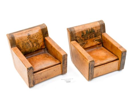 A pair of cigarette boxes, in the form of miniature leather Begere chairs, one inscribed 'Aux les Baines' (2) 