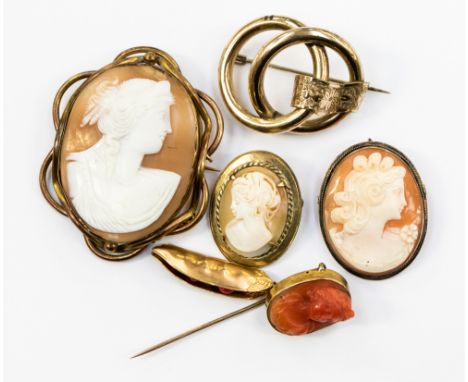 A coral style carved stick pin together with a 19th Century and later cameo's etc
