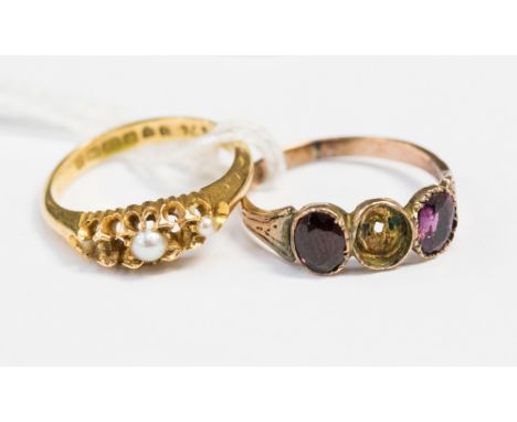 Two ladies dress rings, comprising an 18ct gold seed pearl dress ring and an garnet and paste ring, both af, ring sizes L 1/2