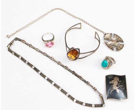 A collection of silver jewellery including Celtic cross pendant necklace, rings, bangle, brooch, etc 