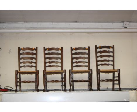 A set of four ash wavy ladder back chairs, with rush seats, (4)