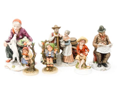 A box of assorted figures, including Hummel and Bisque figures and figure groups, etc