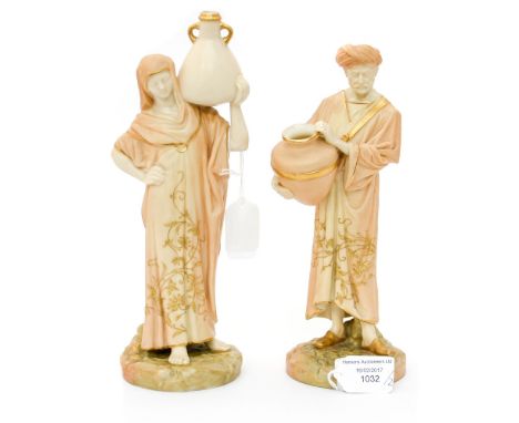 A pair of Royal Worcester blush ivory figures, miniature Cairo Water carriers, shape number 1250, height approx 10 inches 