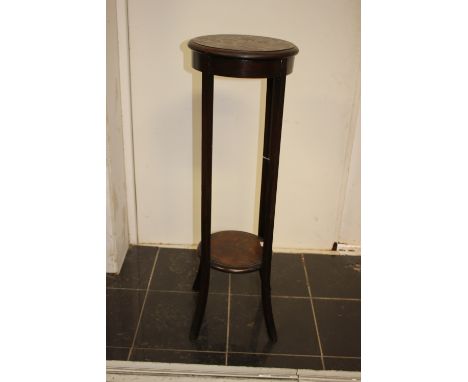 An early 20th Century oak lamp table, of two-tier form