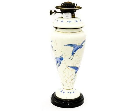 A milk glass, and blue enamel oil lamp base with wick fittings, on stone plinth, retailed by Allan & Co Islington London 1890