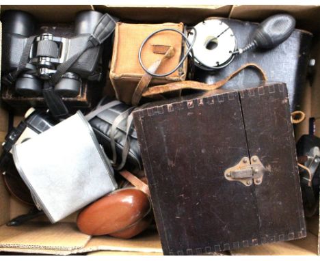 A box containing a large quantity of assorted cameras, mostly mid 20th Century leather cased camera, binoculars, etc 
