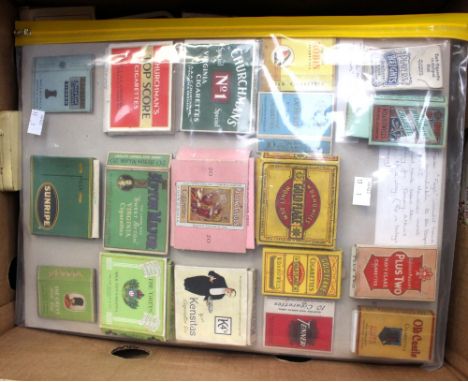 A collection of vintage Cigarette tins, cigar tubes, match boxes, one folder of packets and another thirty empty Cigarette pa