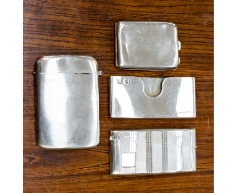 A late Victorian Goldsmiths and Silversmiths silver match book holder, London 1895, a silver card case with engine turned col