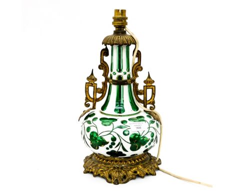 A Bohemian green and white table lamp, with a gilt metal base