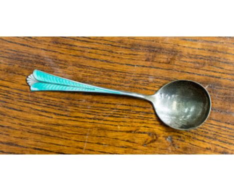 David Andersen, a Norwegian silver and enamelled caddy or preserve spoon, bisected foliate green enamel decoration, 12cm long