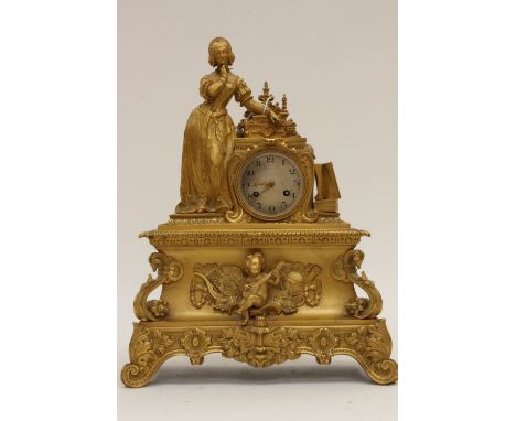 A 19th Century French Ormolu mantle clock, with key and pendulum, Arabic numerals 
