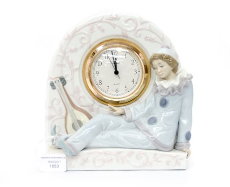 A Lladro figure 'Perrot Clock' impressed mark to base '5778' contained within box.
