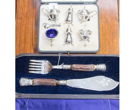 An early 20th century cased cruet set, Birmingham 1922, Mappin & Webb, spoons different makers, approx 213 grams together wit