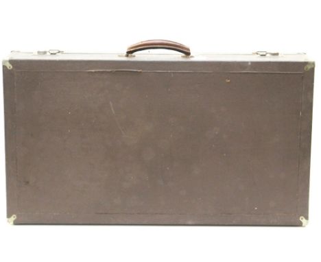 An early 20th Century travelling trunk, fitted with a leather handle, circa 1920