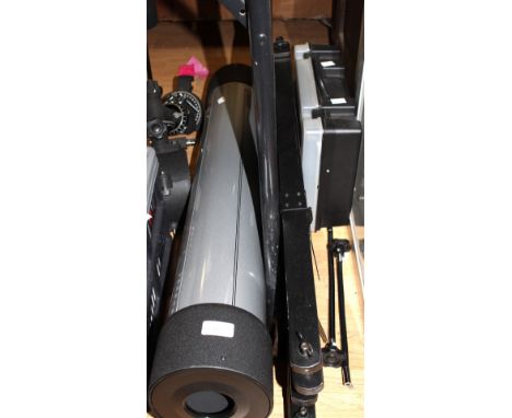 A Tasco telescope, including tripod legs, cased lenses, relevant attachments (comprising eight parts) 