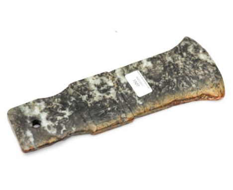A Chinese jade axe head, carved with auspicious inscriptions, of eight character marks and scroll frieze, length 28cm