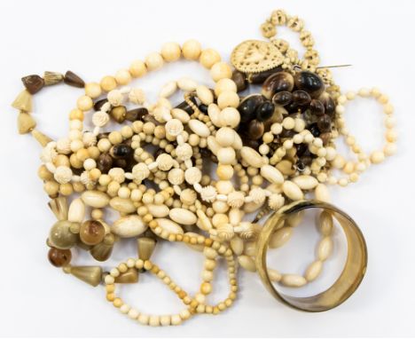 A collection of horn and vintage antique ivory jewellery, beads and bangles etc 