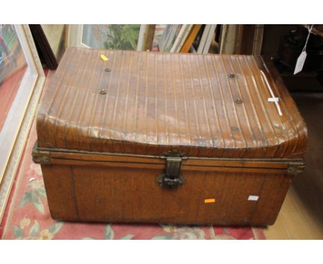 An early 20th Century tin trunk
