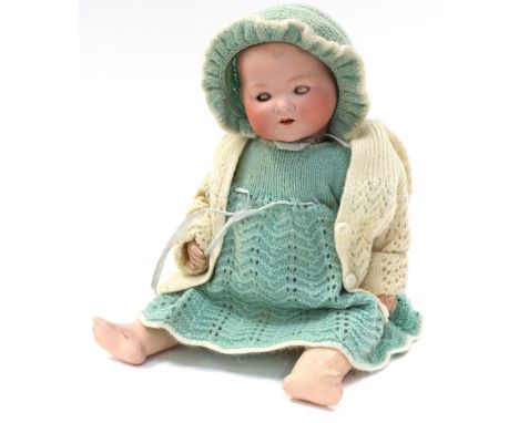 Restoration Project: an Armand Marseille bisque head doll, imprint to back of head 'A.M. Germany 351/3½K' 