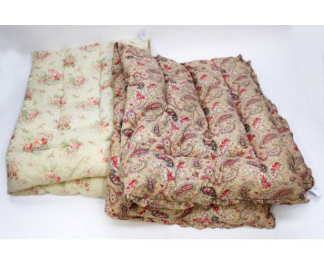 Two eiderdowns filled with feathers, late 1930s or early 1940s to include one floral with pink flowers on a butter cream back