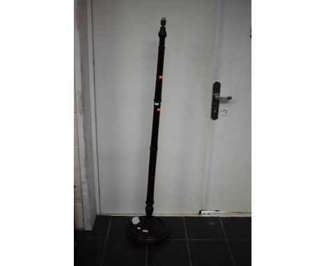 A 20th Century mahogany standard lamp, circular base