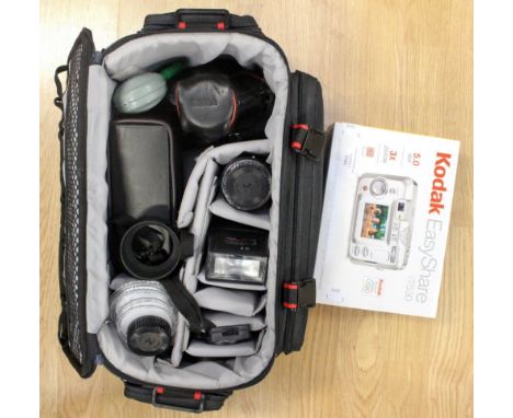 A cased Nikon F301 camera, with two Sigma vari focal lenses, flash, three filters, cable release, etc and a boxed Kodak easy 