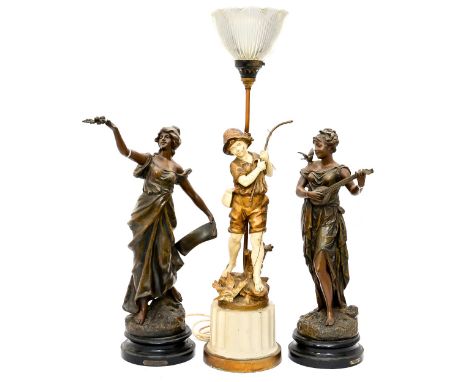 A pair of late 19th Century/early 20th Century spelter figures, the plaques inscribed 'Duo' and 'La Gloire' together with a p