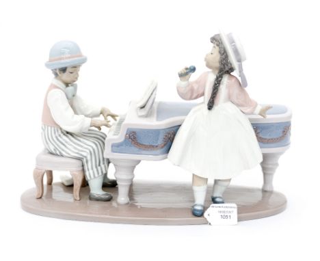 A Lladro figure group of 'A Jazz Duo' number 05930 contained within box.