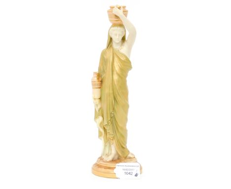 A Royal Worcester figure of water carrier, with a Royal Worcester salt and pepper (3) 