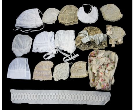 A collection of bonnets (13) to include babies lace bonnets and tulle, one kitchens maid cap and a good lace ladies Victorian