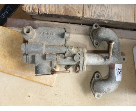 A Zenith carburettor and manifold for an Austin 7.