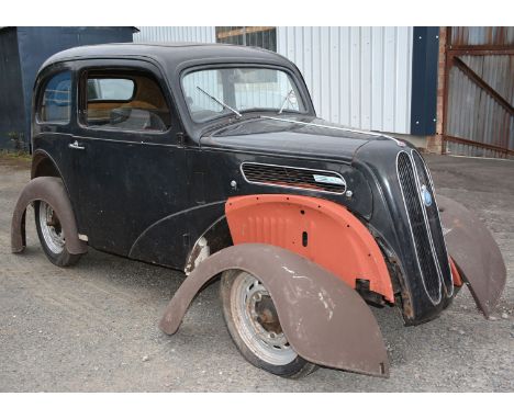 A 1953 Ford Anglia two-door saloon, Registration No. LWP 866. Finished in black. First Registered on the 19/08/1953, 933 cc. 