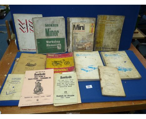 A Jaguar XJ6 and Daimler Sovereign Repair operation manual, a Jaguar XJ12 parts catalogue, a Rover 2000 workshop manual, an O