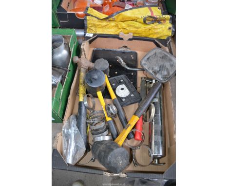 A box containing a hammer, three soft face hammers, grease gun, jubilee clips, a light commercial side mirror and a 7 piece c