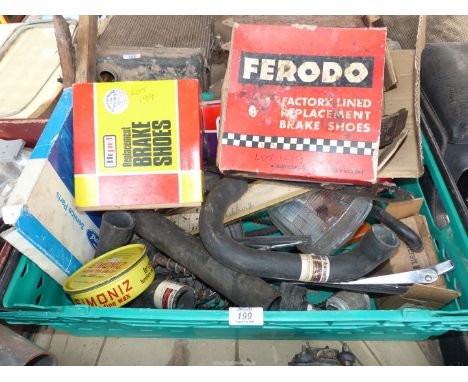 A 12 - 24 volt Voltage reducer (as new in box), a manual choke conversion kit, large tyre gaiters, used brake shoes (possibly