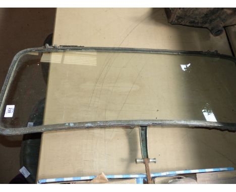 A vintage Austin front windscreen.