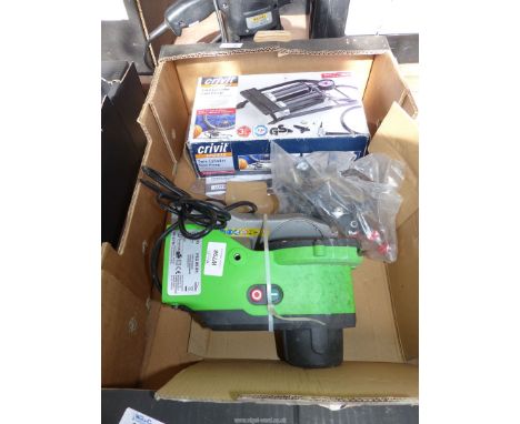 A box containing a "Florabest" Chainsaw sharpener (new) and a twin-cylinder foot pump.