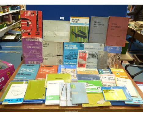 A quantity of classic car owner handbooks and manuals to include: DAF, Simca 1300 service manual, Fiat, Triumph, etc.