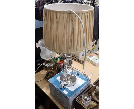 Metal based table lamp with glass bubble stem and a crystal effect light shade, lamp H: 60 cm. Not available for in-house P&a