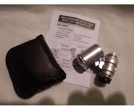 Cased 60 x magnification jewellery/currency detecting loupe with LED light, batteries and instructions. P&amp;P Group 1 (£14+