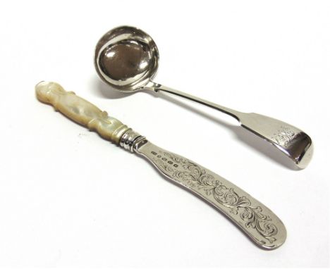 A VICTORIAN EXETER SILVER SAUCE LADLE  by Thomas Hart Stone, 1864, fiddle pattern, monogrammed; with a Victorian silver blade