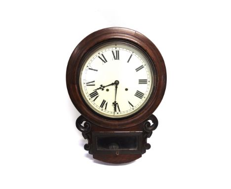 A MAHOGANY CASED DROP DIAL WALL CLOCK  with carved decoration, the 12' enamel dial with Roman numerals, 44cm wide 82.5cm high