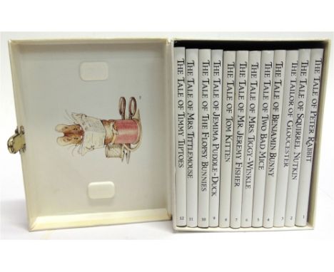 ASSORTED COLLECTABLES  comprising a set of twelve Beatrix Potter books, boxed; cigarette cards; stamps; postcards; a poker-wo