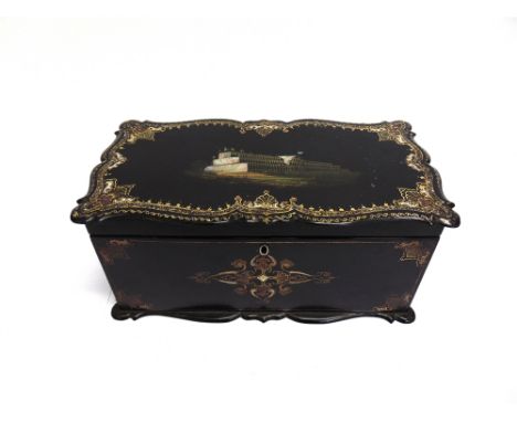 A VICTORIAN PAPIER MACHE TEA CADDY  the hinged lid decorated with a scene of Crystal Palace, the interior with twin compartme