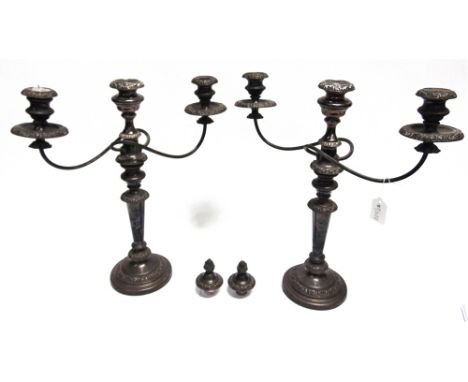 A PAIR OF SILVER PLATED CANDELABRA  each with pair of arms issuing from central removable boss, allowing a combination of dif