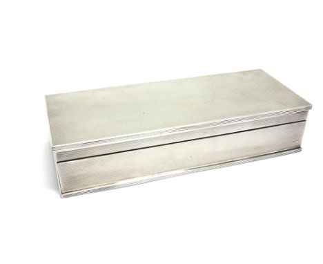 A SILVER CIGARETTE BOX  by A. Wilcox, Birmingham 1951, of long rectangular form, with all over engine turned decoration, 23.3