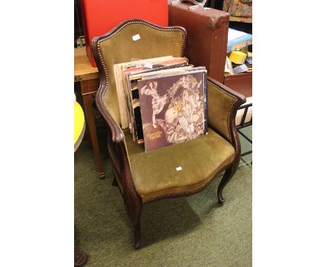 Upholstered wooden framed chair with brass button decoration 