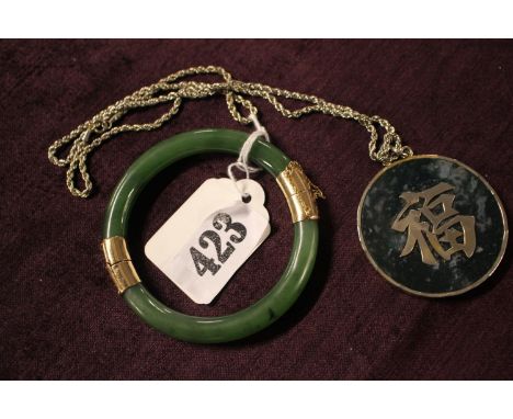 Jade Pendant in Yellow metal mount and a Jade Bangle with yellow metal mounts 