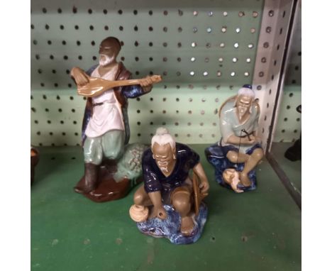 SHELF OF ORIENTAL FIGURES, SOME OF FISHERMAN ETC